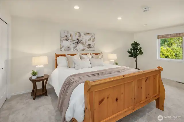 Primary bedroom with peek-a-boo lake views