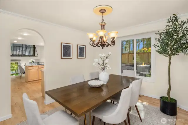 Cozy and elegant dining looking out on gardens