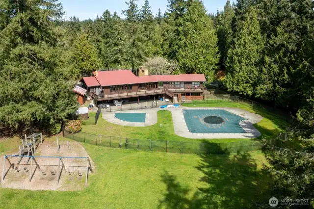 Shore Woods community includes a club house, swimming pool, tennis courts and playground.