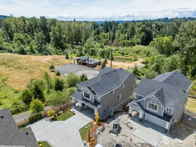 Perfectly situated to provide privacy and open space on one side, and a roomy driveway.