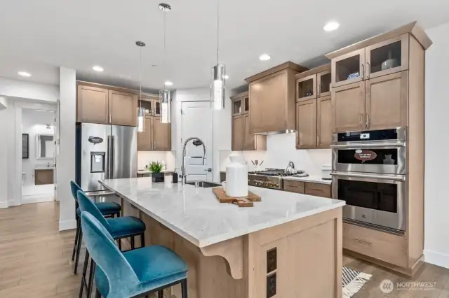 Photos from model home in previous community-features/finishes will vary