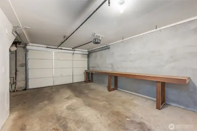 Garage with plenty of space for parking and storage.