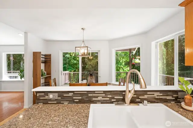 Enjoy modern comforts including a forced air heat pump with A/C, and watch wildlife and birds from the wraparound deck or while dining surrounded by windows.