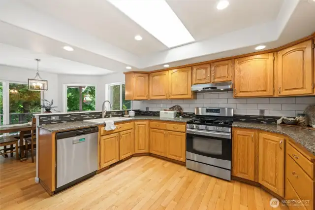 Granite counter tops and views of the lush green from every window.
