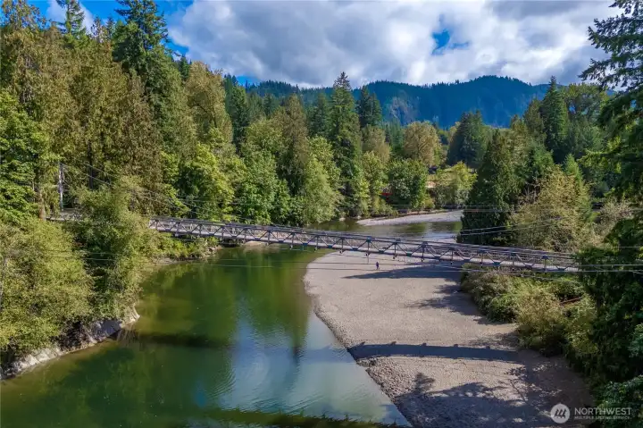 Community Pedestrian Bridge and River Beach
