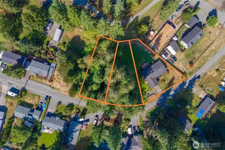 All 3 lots are being sold together. 2 vacant lots and the lot with the house. Lines are approximate.