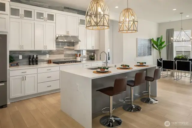 Kitchen and island. Photo taken from a similar model, may contain upgrades.