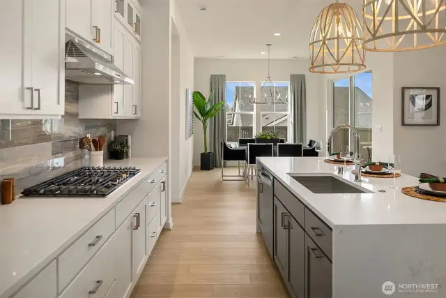 Kitchen and dining space. Photo taken from a similar model, may contain upgrades.