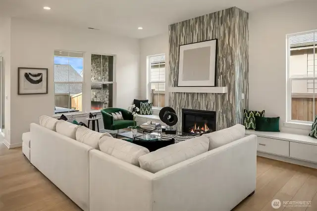 Great room and fireplace. Photo taken from a similar model, may contain upgrades.
