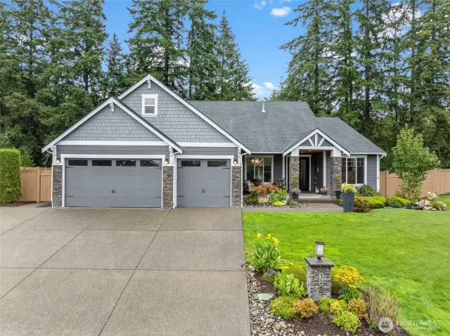 Trinity Ridge is a charming gated community off Rosedale sitting on a third of an acre with an open space buffer behind the home for added privacy.