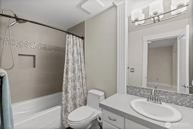 An upper level full bathroom provides the perfect place for visiting guests to have their own private space while visiting.