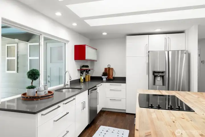 Enjoy stainless steel appliances, crisp white cabinets.