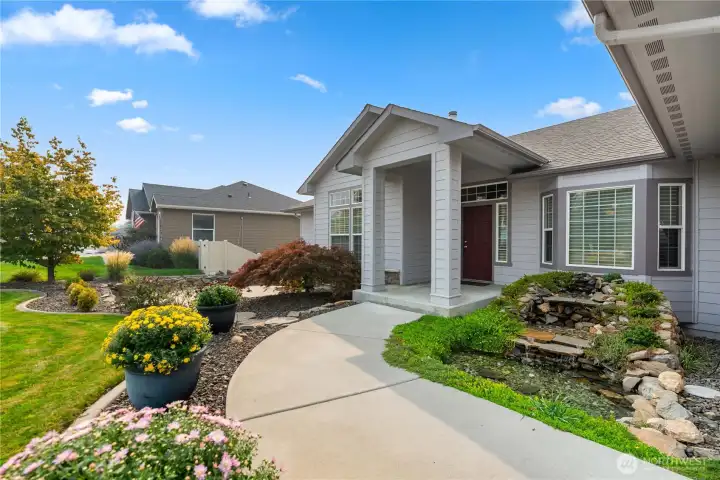 Peacefully sounding water feature welcomes you home.