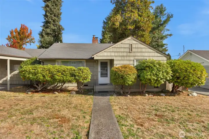 Front of home has mature vegitation providing additional privacy within the home.