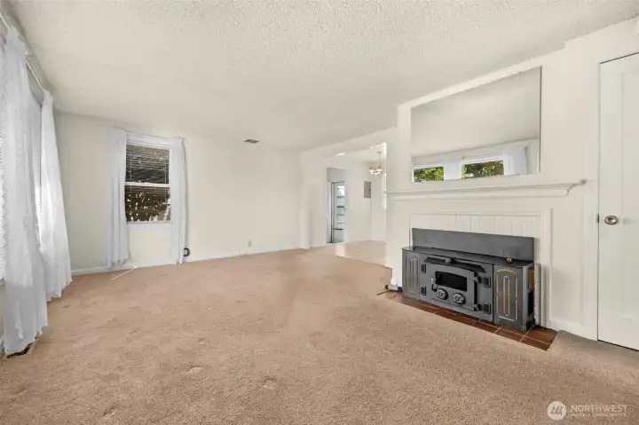 View of living room as you enter from the front door.