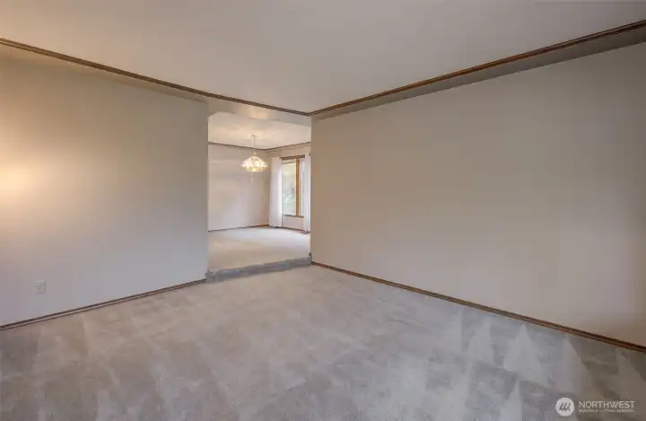 Spacious living room with custom wood inlaid ceiling