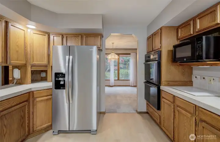 Spacious, well-appointed kitchen with abundant counter space and so much storage!