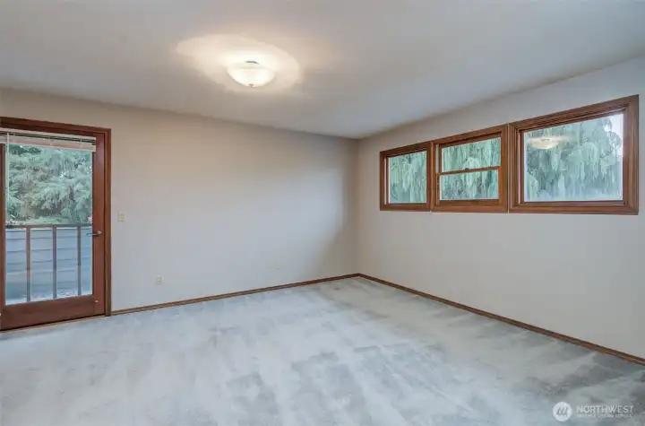 Primary suite is ready to settle in for a quiet nights sleep after stargazing from your balcony!