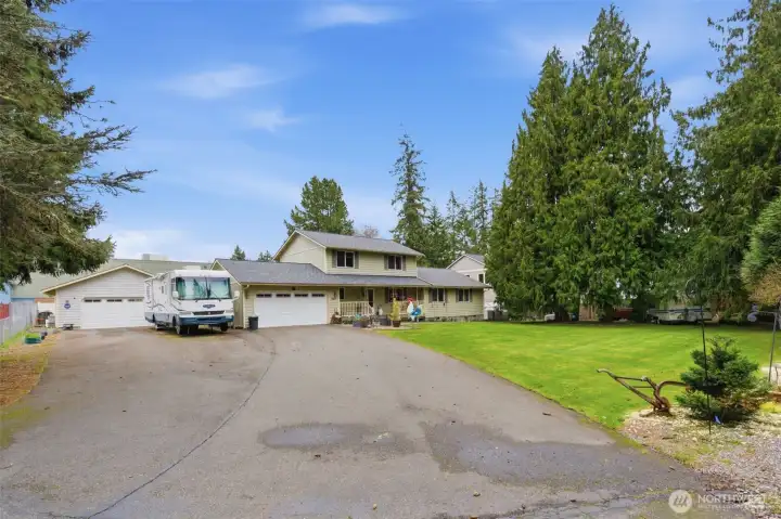 Extra long driveway and detached 2-car garage.