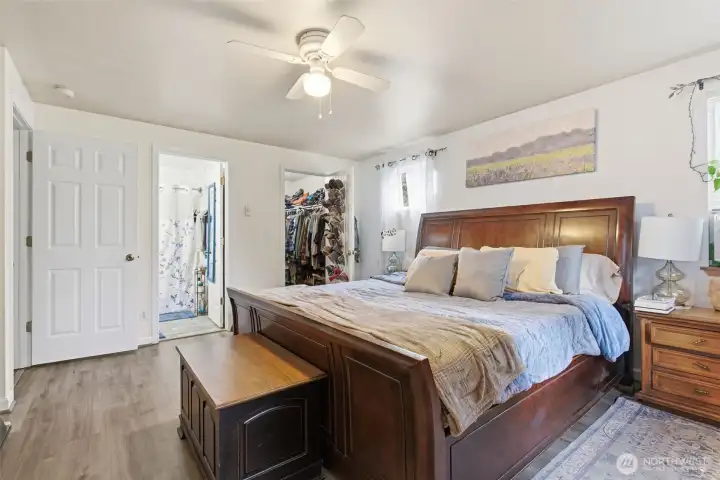Upstairs primary bedroom- back right is walk-in closet, left is the primary bathroom
