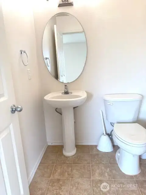 Half bath/ guest bath on the first floor.