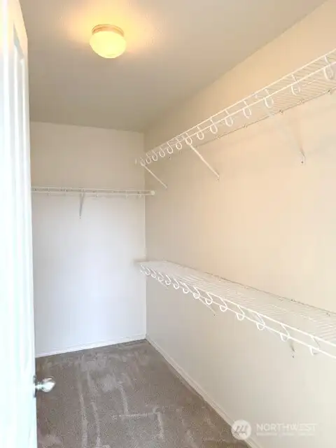 Huge walk-in primary closet!