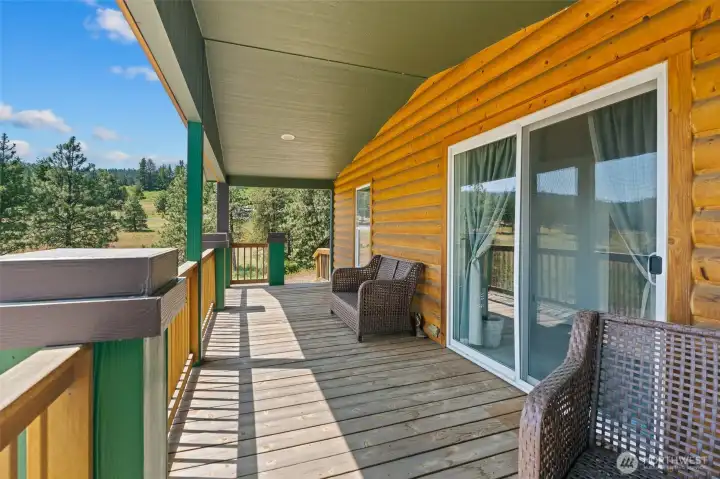 Watch the world go by off this spacious deck.  Morning coffee never tasted so good.