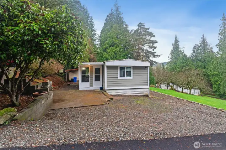 Beautifully maintained home featuring mature landscaping and a welcoming front entrance. Beautifully maintained home featuring mature landscaping and a welcoming front entrance.