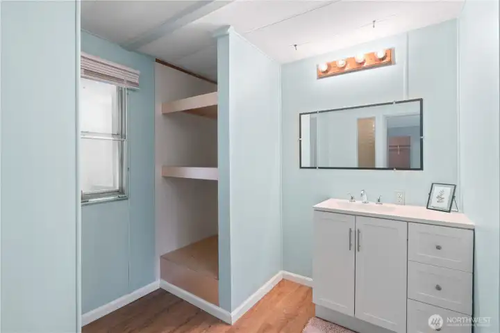 Primary bathroom with spacious vanity and ample storage. Primary bathroom with spacious vanity and ample storage.