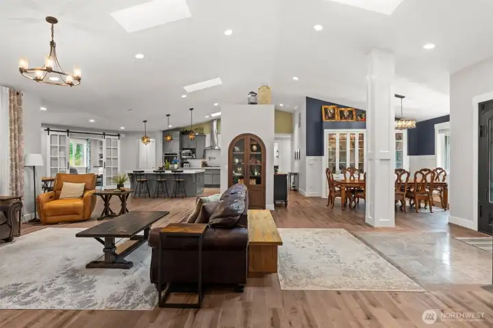 The open-concept design connects the great room, dining room, and kitchen, creating a spacious setting for everyday living and entertaining
