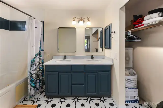 Primary en-suite features more closet space and dual sinks.