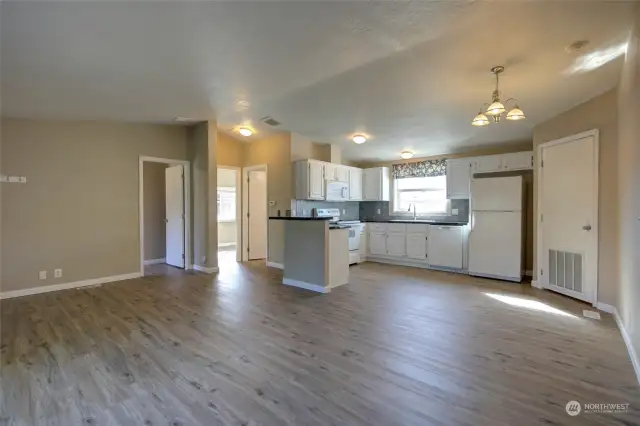 Second and third bedrooms and main bath are to the left of the kitchen.