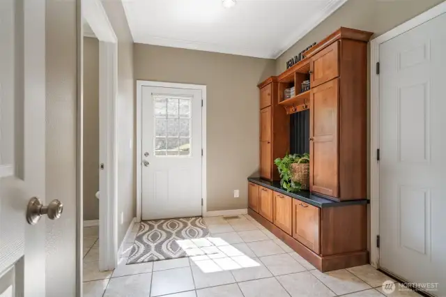 Mudroom off Garage with door to back yard
