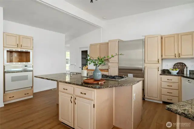 Plenty of cabinetry space and a large walk-in pantry for extra storage!