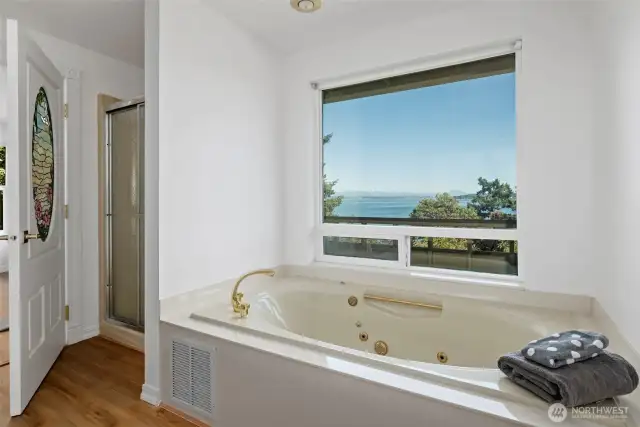 Ensuite bath includes a large soaking tub and separate shower.