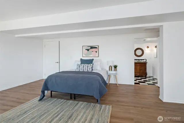 Third bedroom is located on the lower level and includes a spacious walk-in closet and ensuite bath.