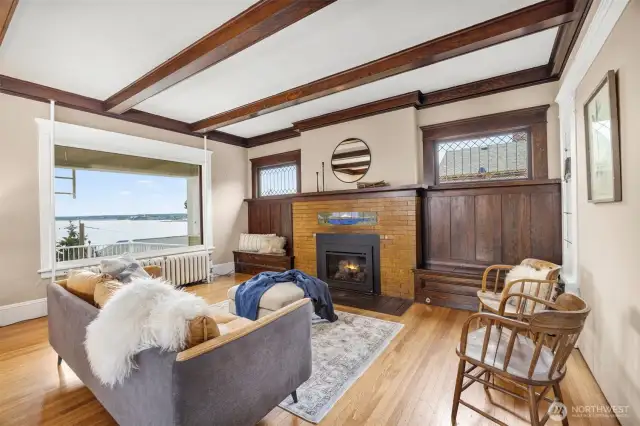 Traditional built-in benches, original woodwork, box beam ceilings, oak floors and comfort.