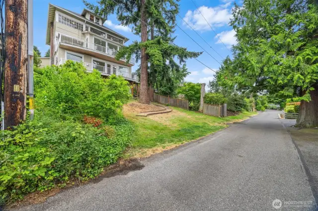 Forest Lane runs below the property. It provides excellent access to the lower basement and south stairway.