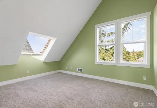 High, vaulted ceilings in both guest rooms with large, walk-in closets.