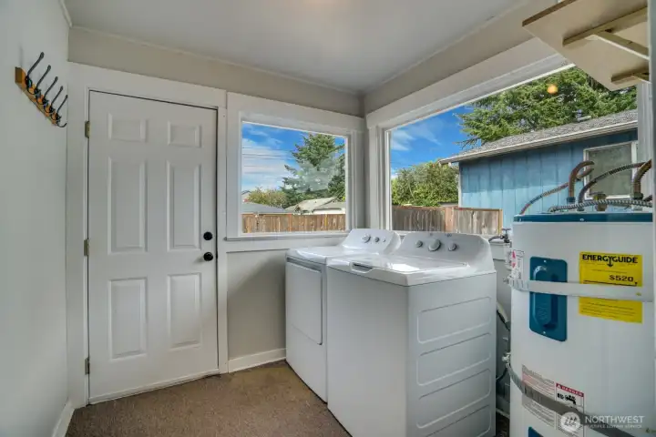 Laundry room opens to then backyard.