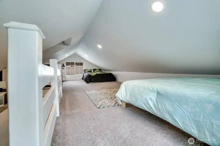 Owners installed canned lights, flooring and paint. The ceiling height is low - this is the perfect space for your kids room or designated spot to play.