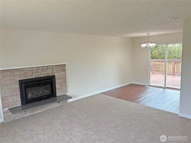 Living room view in a 3-bed + flex, 2-bath split-level; clean, refreshed finishes and flexible layout in Cascade, Renton 98058.