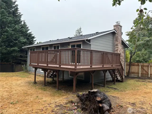 Rear elevation overlooking the deep backyard—ample outdoor space for entertaining at 16312 127th Pl SE, Renton.