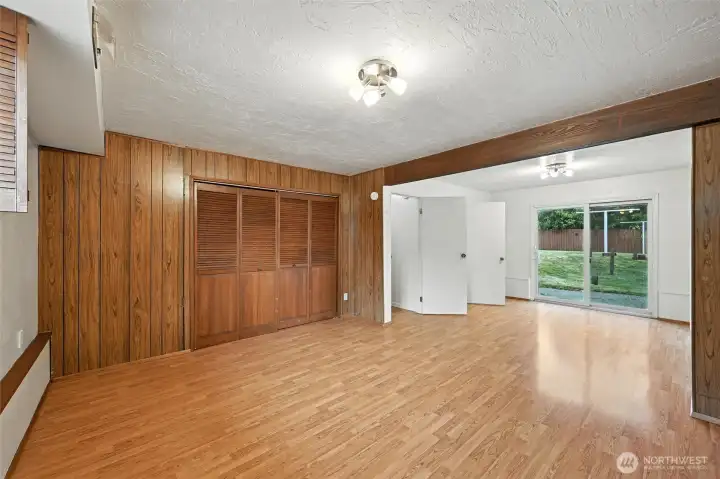 Downstairs rec room with view of sliding door to back yard