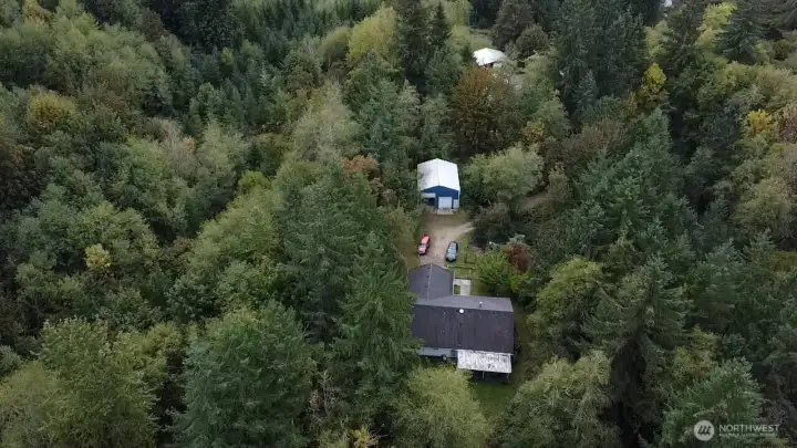 Property view with home and shop