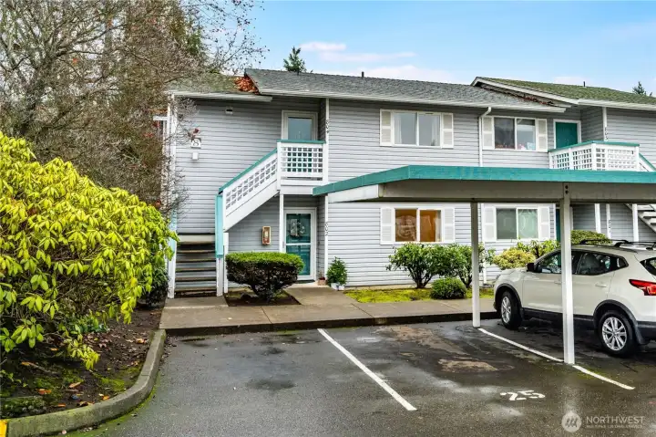 Unit #802 is a single-level, ground floor, end unit. The reserved, covered parking is right in front of the door!