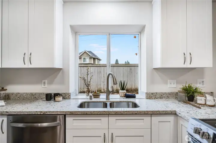 The dishwasher, fridge, sink, faucet, and countertops are also new and ready to enjoy.