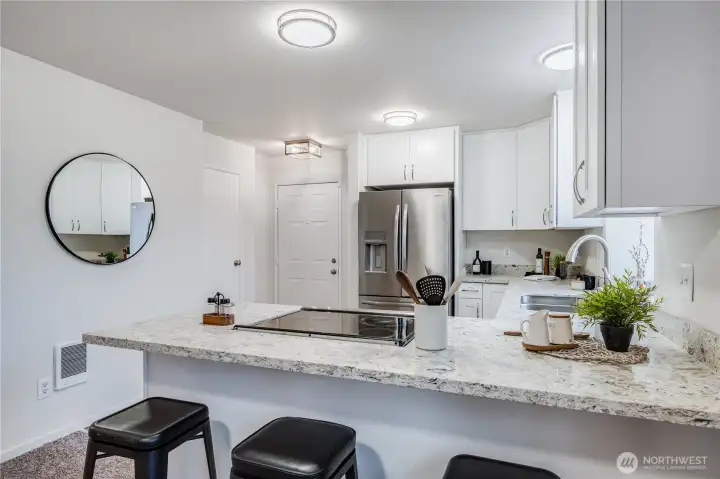 Beautiful quartz countertops provide a modern setting for preparing your favorite dishes!