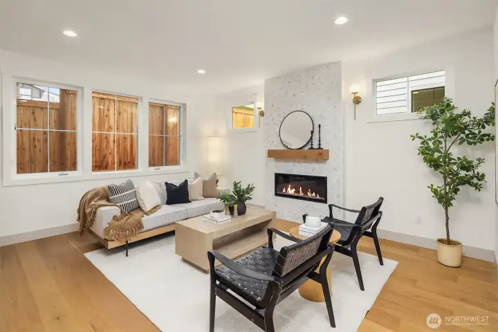 Cozy living area with fireplace and custom tile surround