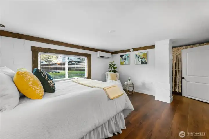 Primary bedroom with walk-in closet